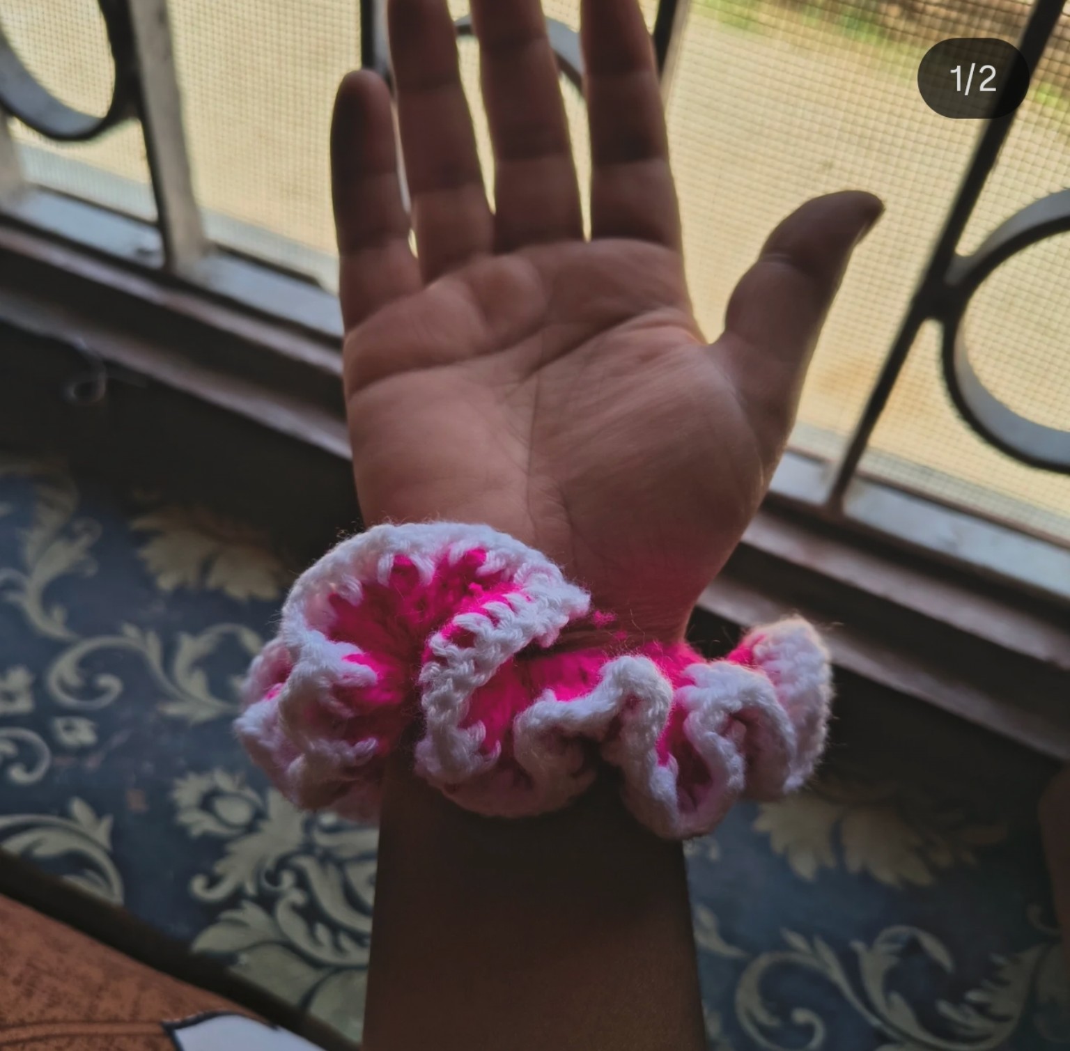 Soft, voluminous hand-crocheted hair scrunchie with delicate scalloped contrast edging